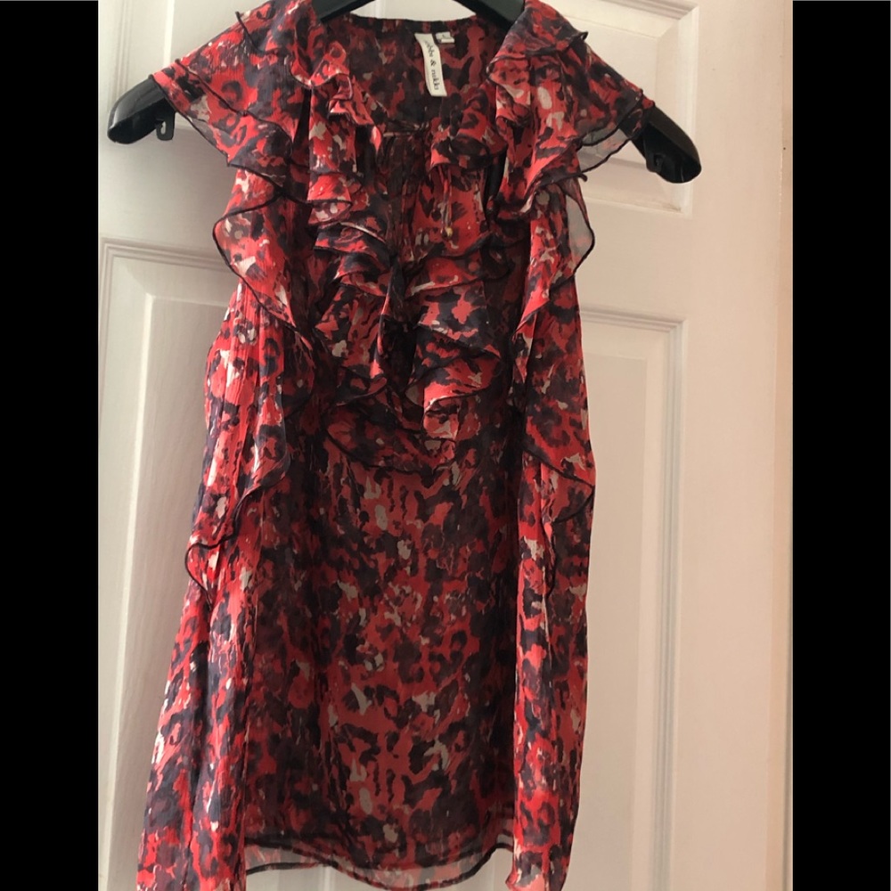 Beautiful lightweight ruffle sleeveless blouse